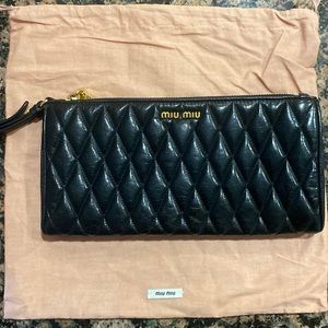 Miu Miu patent leather clutch bag